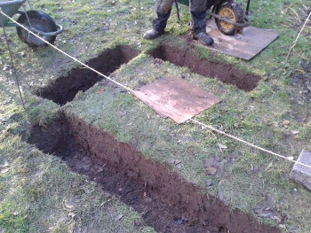 We're building a large and high raised bed. To contain all that soil, we need sturdy sides.
